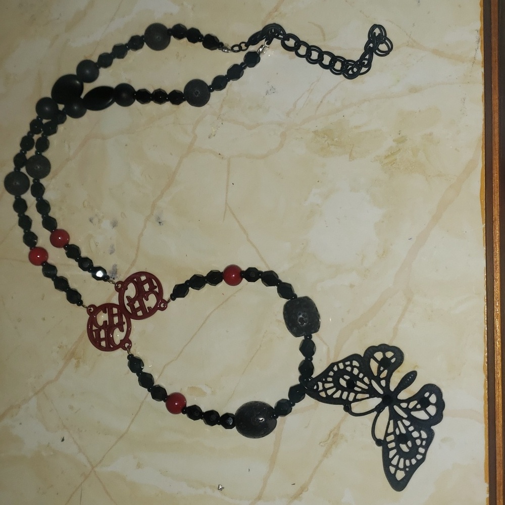Semi precious stone butterfly pendent necklace.